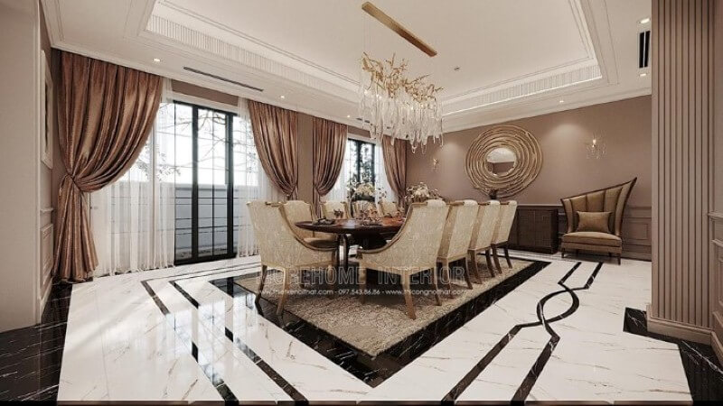 Bộ bàn ăn 10 người đẹp, sang trọng với hoa văn trang trí đẹp mắt tạo điểm nhấn ấn tượng cho không gian đương đại. Thiết kế nội thất biệt thự tại Hà Nội