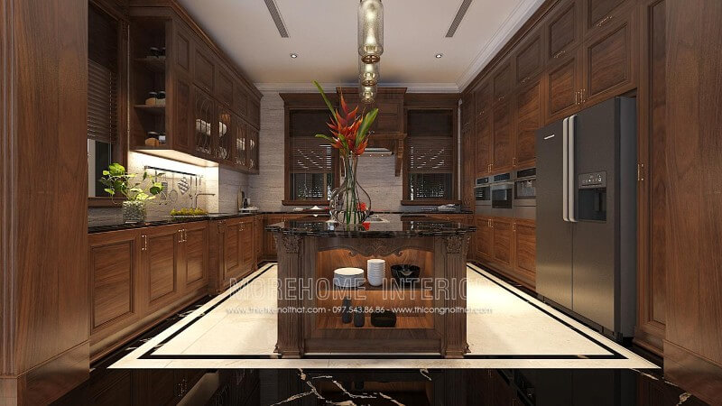 Kết hợp giữa những đường nét cổ điển pha với một chút hiện đại, tủ bếp óc chó tân cổ điển đã tạo nên một không gian nhà bếp biệt thự đầy sang trọng và mê hoặc Thiết kế nội thất biệt thự